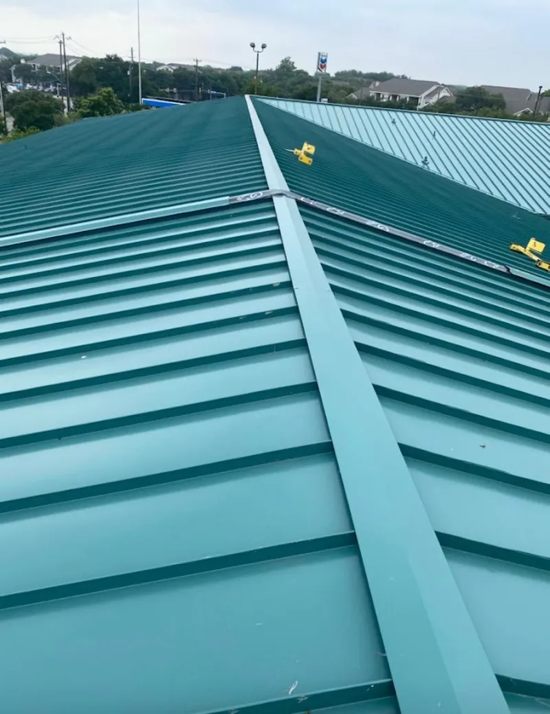 Green commercial metal roof ridge and valley for Metal Roof Repair in Franklin Farm