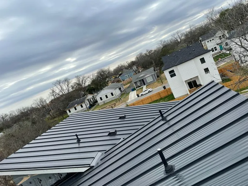 Standing seam metal roof panels with vents for Skylight Repair in Franklin Farm